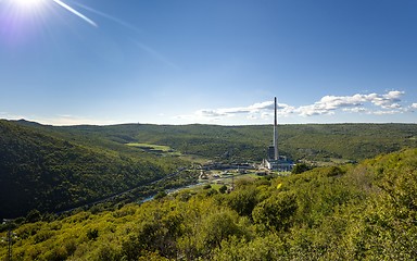Image showing Large valley with power plant