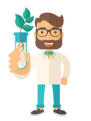 Image showing Chemist with tube and eco leaves.