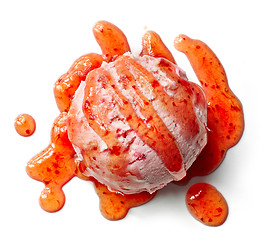 Image showing ice cream ball with strawberry sauce