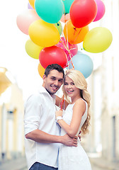 Image showing couple with colorful balloons