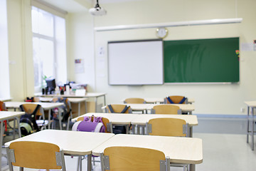 Image showing school classroom with desks and blackboard