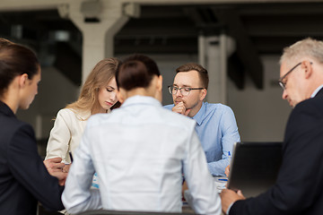 Image showing smiling business people meeting in office