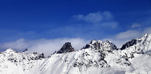 Image showing Panoramic view on snowy mountains at sun day