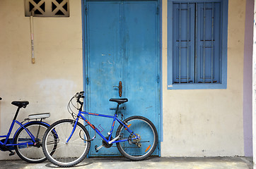 Image showing Bicycle and  painted brick wall