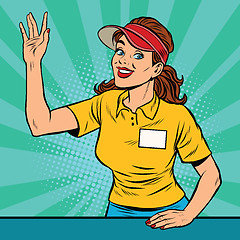 Image showing Joyful young female fast food worker takes the order