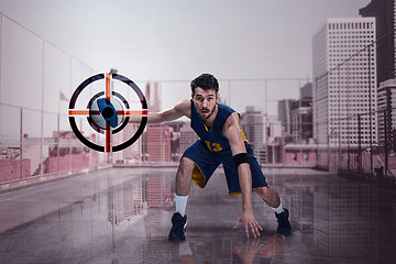 Image showing Full length portrait of a basketball player with ball