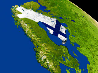 Image showing Finland with flag on Earth
