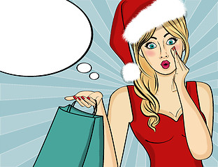 Image showing Pop art Santa girl. Pin up Santa girl. Santa Girl with shopping 