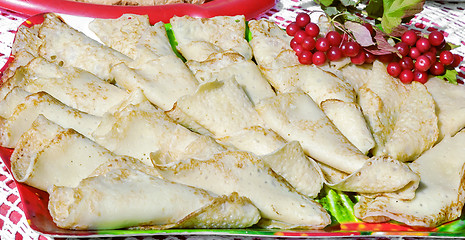 Image showing Pancakes, decorated with viburnum berries .