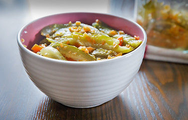 Image showing Marinated cucumbers with carrots and spices.