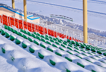 Image showing Background chairs at stadium , winter