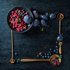 Image showing frame with berries and figs