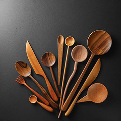 Image showing Wooden spoons and knife