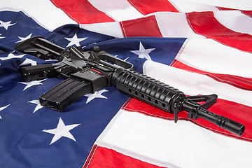 Image showing Stars, Stripes And Submachine Gun