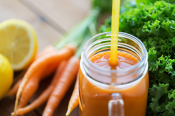 Image showing close up of carrot juice, fruits and vegetables