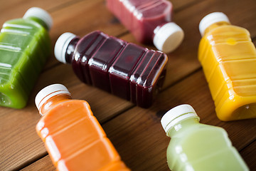 Image showing bottles with different fruit or vegetable juices