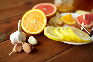 Image showing garlic, lemon, orange and other folk remedy