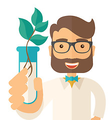 Image showing Chemist with tube and eco leaves.