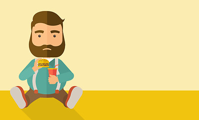 Image showing Fat man sitting while eating.  