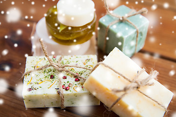 Image showing close up of handmade soap bars on wood