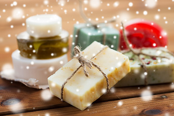 Image showing close up of handmade soap bars on wood