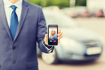 Image showing close up of business man with smartphone call