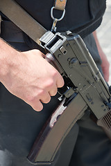 Image showing Ukrainian soldier with machine gun.