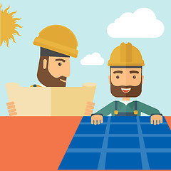 Image showing Man putting a solar panel on the roof.