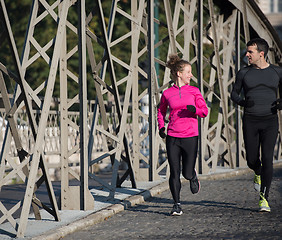 Image showing young  couple jogging