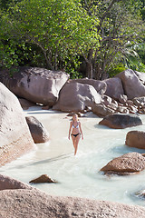 Image showing Woman enjoying Anse Lazio picture perfect beach on Praslin Island, Seychelles.