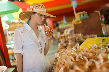 Image showing Traveler shopping on traditional Victoria food market, Seychelles.