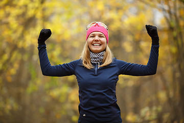 Image showing Young sporty woman doing exercises