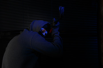 Image showing Night burglar with master key