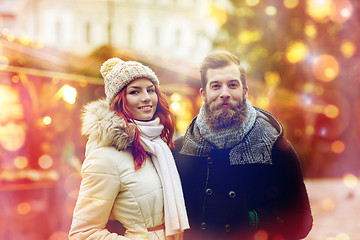 Image showing happy couple walking in old town