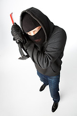 Image showing Burglar winks in black mask