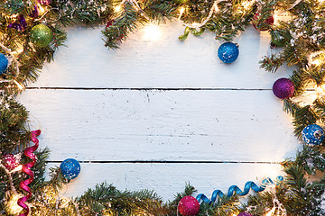 Image showing Festive background with wooden surface and Christmas decorations