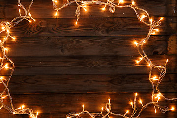 Image showing Festive Christmas and new year dark brown wooden background