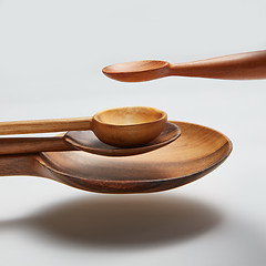 Image showing different wood spoon isolated in air