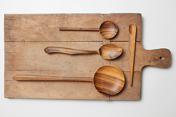 Image showing Kitchenware set of wooden plate,  spoons,  knife