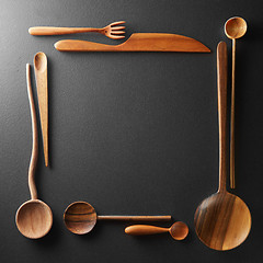 Image showing frame of wooden spoons, forks and a knife