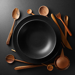 Image showing plates and wooden cutlery
