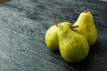 Image showing Three green pears