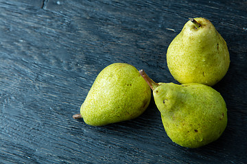 Image showing Three green pears