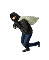 Image showing Thief running with heavy bag