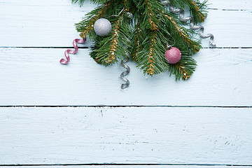 Image showing Wooden surface closeup with Christmas decoration at the top