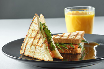 Image showing salmon sandwich with juice. Healthy food