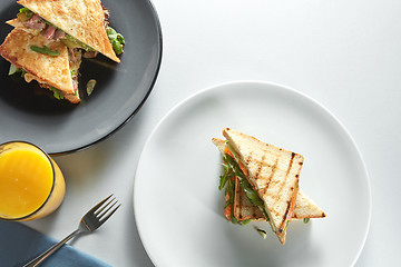 Image showing sandwiches on plates