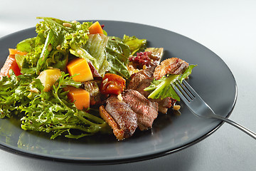 Image showing salad with pumpkin on white background