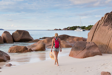 Image showing Woman enjoying Anse Lazio picture perfect beach on Praslin Island, Seychelles.