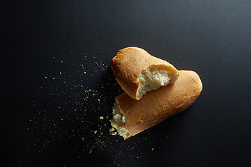 Image showing Fresh baked bread loaf broken